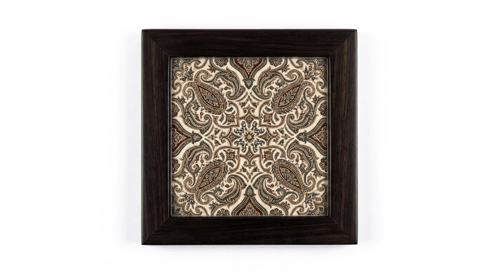 Five-inch coasters in solid wood and glass, each cut from a panel of hand-woven silk.