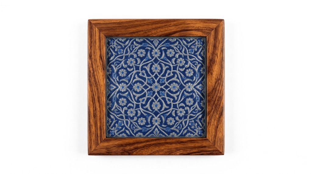 Five-inch coasters in solid wood and glass, each cut from a panel of hand-woven silk.